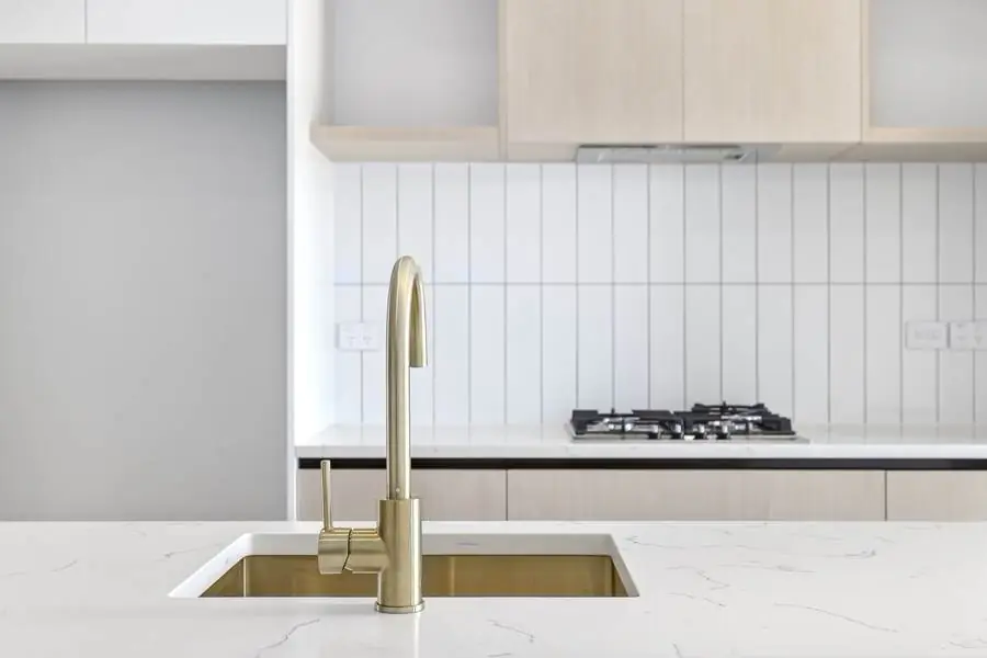 23 Wooing Tree — Kitchen sink with brushed brass tapware