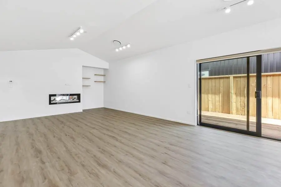 23 Wooing Tree — Living area with sliding doors to the deck